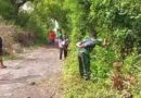 Babinsa dan Warga Kerja Bakti Ciptakan Akses Jalan yang Bersih dan Nyaman Menuju Makam